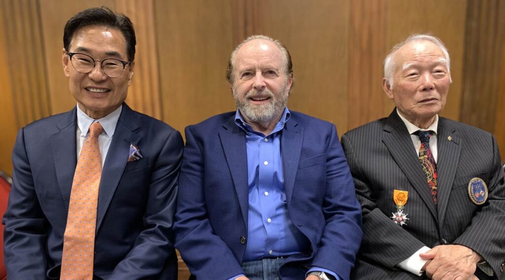 Grand Master Han Lee, WKF ex-Chairman Jim Wigginton, and Great Grand Master Hwa Chong on 12 October 2024 at the University of Michigan's Michigan League, Ann Arbor, Michigan USA